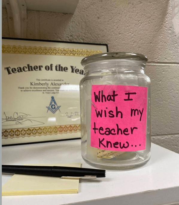 A jar on a shelf with a pink note taped reads, What I wish my teacher knew.
