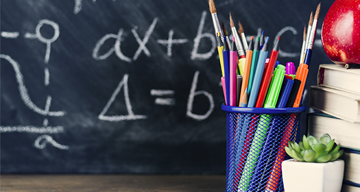 Chalkboard showing middle school math. 