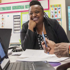 Educator participating in an i-Ready coaching session. 