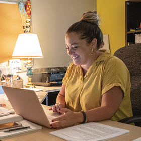 Teacher with computer.