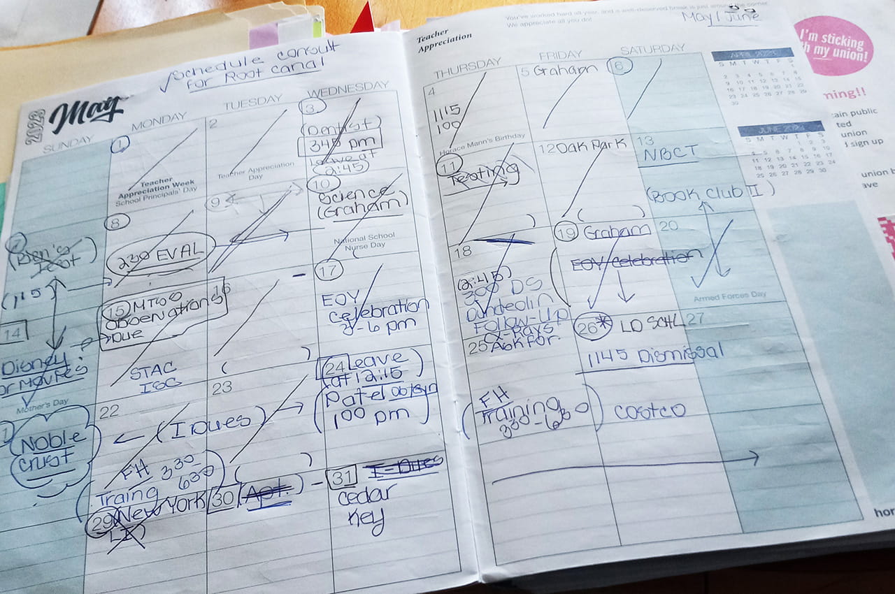A teacher's planner filled with notes in the month of May.